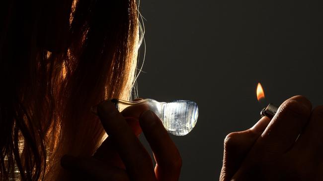 Smoking a crack pipe.Photo:John Gass / Tweed Daily News