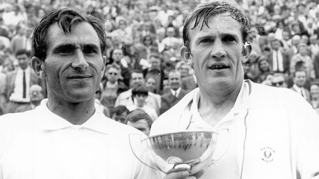  1966. Tony Roche holds the trophy after beating Istvan Gulyas in the final of the French Open in Paris. Tennis. SUPPLIED PHO...