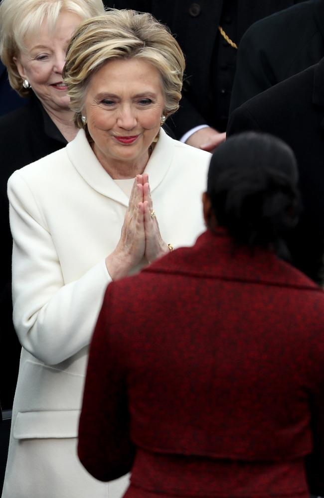 Former Democratic presidential nominee Hillary Clinton greets Michelle Obama on the West Front of the U.S. Capitol on January 20, 2017 in Washington, DC. Picture: AFP