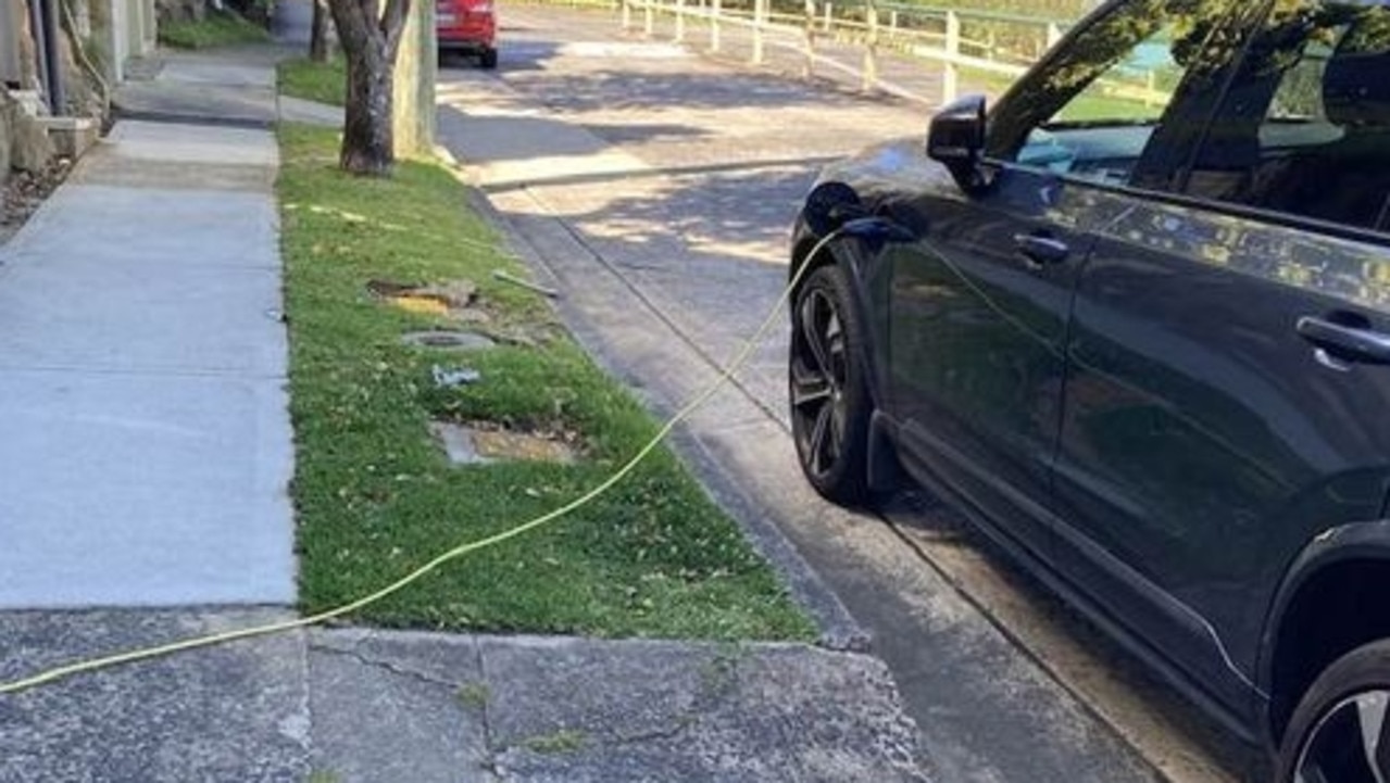 An extension cord running across a footpath into an EV. Picture: Mosman Living Facebook group
