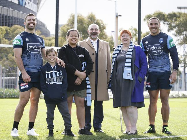 The young Blues fans with NSW players James Tedesco and Tyson Frizell, along with Lee Hagipentelis from Brydens Lawyers and Liverpool Mayor Wendy Waller. Picture: Dylan Robinson