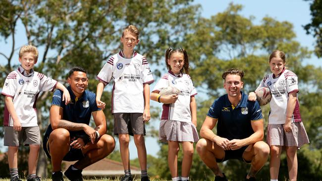 Parramatta Eels players John Folau and Clint Gutherson chat to Crestwood Public school students Ashton Naylor, Oliver Wong, Chloe Jones and Breanna Fisher-Dietsch.