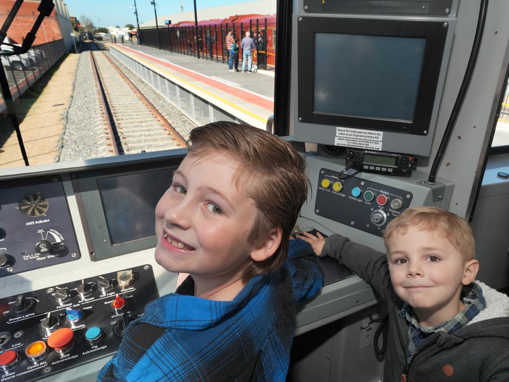 The new Port Dock station is now open, and Stanley,4, (R), and friend Jacob,10, were there in the driverÃ&#149;s seat for the celebration. 24 August 2024. Picture: Dean Martin