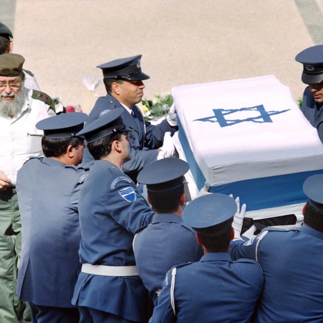 1995 photo of Israeli Knesset honorguards carrying the coffin of assassinated Israeli Premier Yitzhak Rabin outside the Knesset. Picture: Manoocher DEGHATI / AFP.