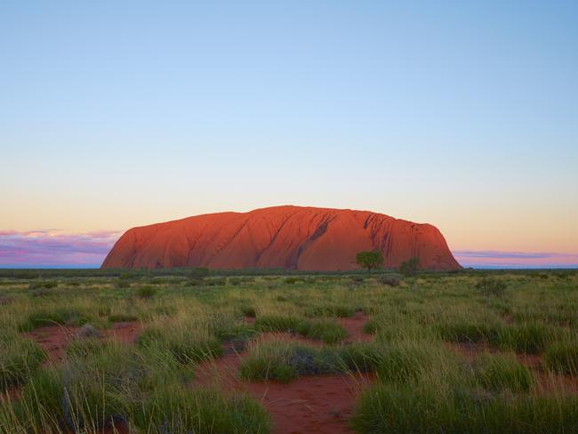 Northern Territory, Australia: The sun is setting at Uluru in the heart of the Australian Outback.Photo - istockGreat Escape Travel Survey 2024