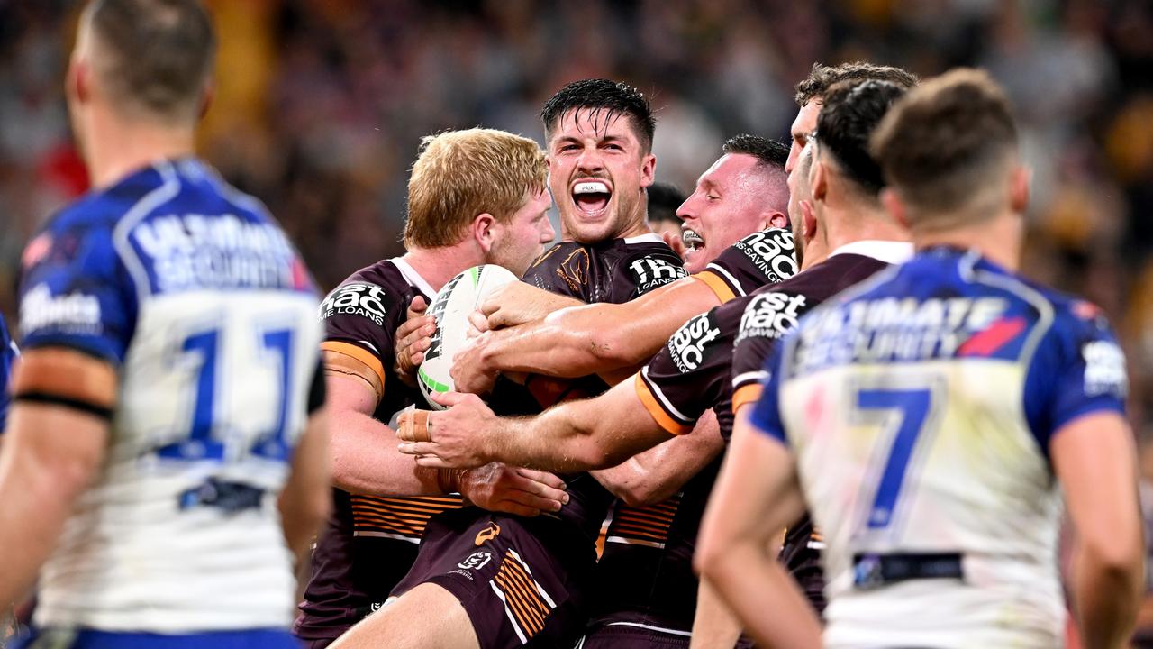 BRISBANE, AUSTRALIA - APRIL 22: Cory Paix of the Broncos celebrates scoring a try during the round seven NRL match between the Brisbane Broncos and the Canterbury Bulldogs at Suncorp Stadium, on April 22, 2022, in Brisbane, Australia. (Photo by Bradley Kanaris/Getty Images)