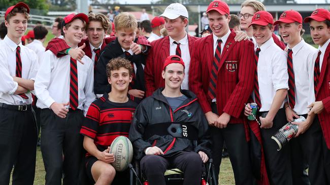 Conor Tweedy, front, centre, joined his Terrace Second XV teammates after their game last month. Picture: Liam Kidston