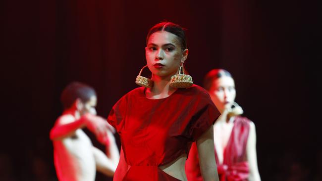 Nardia Blackhall models the Yarrabah Affirmations collection by the Yarrabah Arts & Culture Precinct at the Cairns Indigenous Art Fair fashion performance, Woven, held at the Tanks Arts Centre, Edge Hill. Picture: Brendan Radke