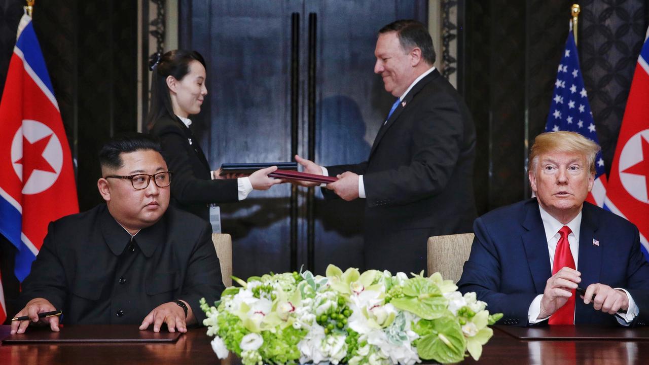 At the 2018 US – North Korea summit, Kim Yo-jong exchanged documents with US Secretary of State Mike Pompeo. Picture: AFP PHOTO / THE STRAITS TIMES / Kevin LIM.