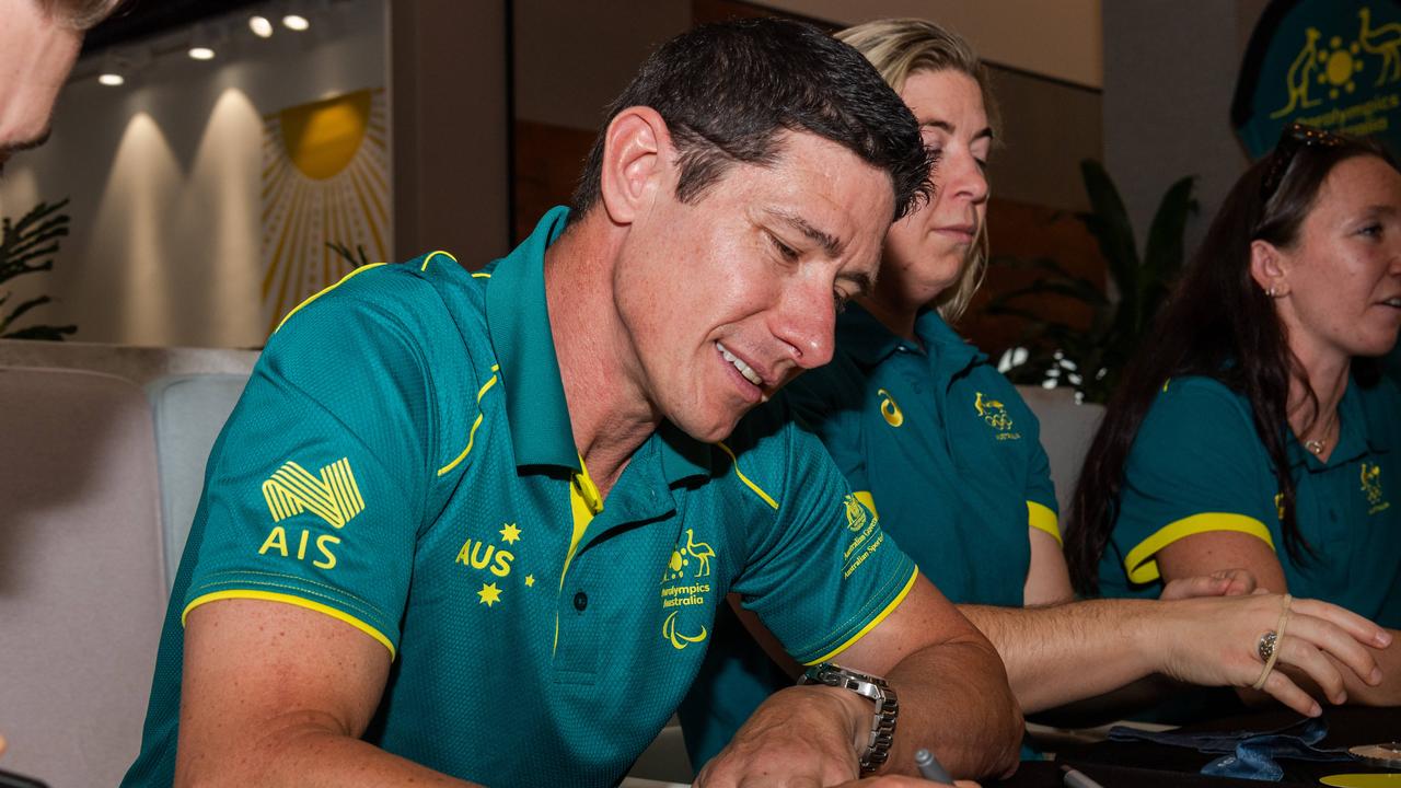 Darren Hicks signing autographs at the Olympic and Paralympic teams Welcome Home Celebrations at Casuarina shopping centre, Darwin, Oct 2024. Picture: Pema Tamang Pakhrin