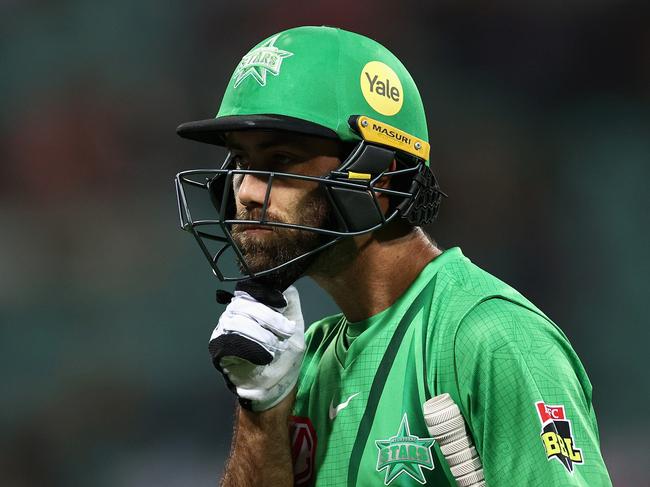 SYDNEY, AUSTRALIA - DECEMBER 05: Glenn Maxwell of the Stars leaves the field after being dismissed by Sean Abbott of the Sixers during the Men's Big Bash League match between the Sydney Sixers and the Melbourne Stars at Sydney Cricket Ground, on December 05, 2021, in Sydney, Australia. (Photo by Cameron Spencer/Getty Images)