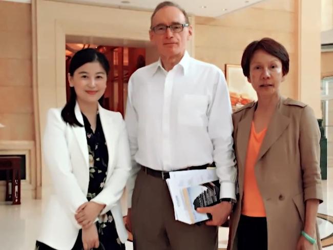 Jean Dong, left, with former foreign minister Bob Carr and his wife, Helena