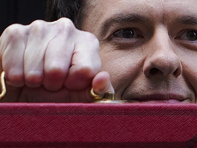 British Finance Minister George Osborne with the Budget papers in a red briefcase. Picture: AFP/ JUSTIN TALLIS