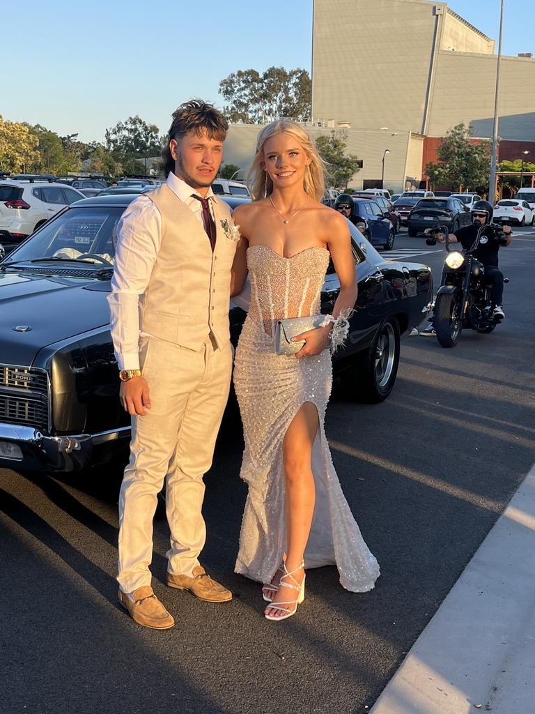 Madison Andrews and Reuben Broome arrive at the Aldridge State High School formal.