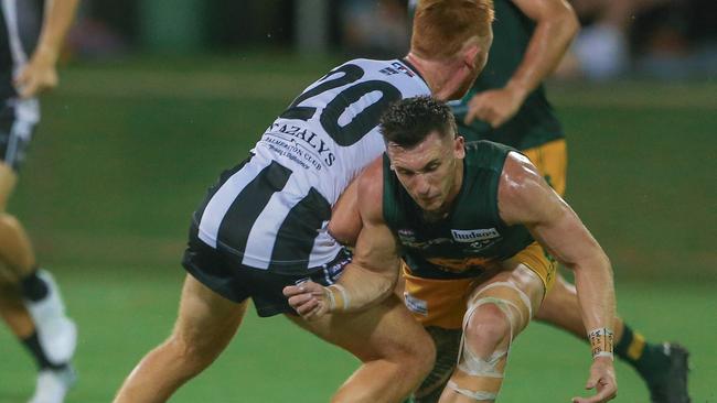 Palmerston’s Eric Guthrie tackles St Mary’s Lucas Jellyman-Turner. Picture: Glenn Campbell