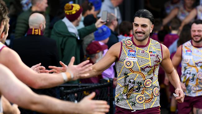 Steve Tolongs of Murrumbeena runs out onto the field for his 200th game. (Photo by Josh Chadwick)