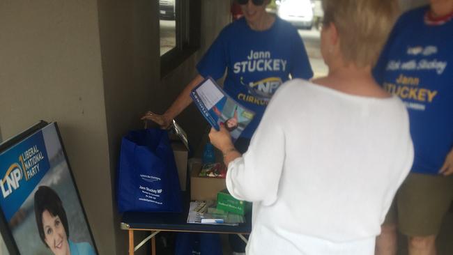 The volunteer with LNP how to vote cards. Picture: Supplied