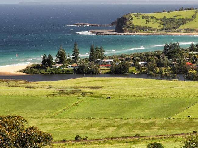 View over the coastal landscape, the town of Gerrigong and Werri Beach in New South Wales, Australia. Photo: Alamy Fee applies, single use, must credit