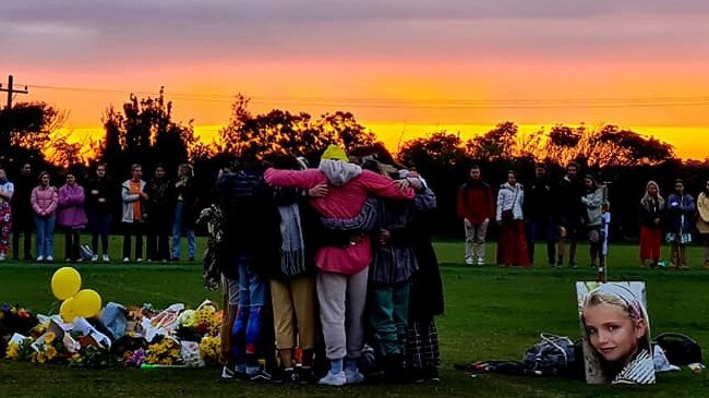 Family and friends attended a Sunday sunset memorial gathering at Tania Park, Balgowlah Heights, to remember Annika Ferry, 21, who died after falling at an abandoned military bunker on Sydney's North Head while watching a sunrise. Picture: Facebook/Roderic Fennell