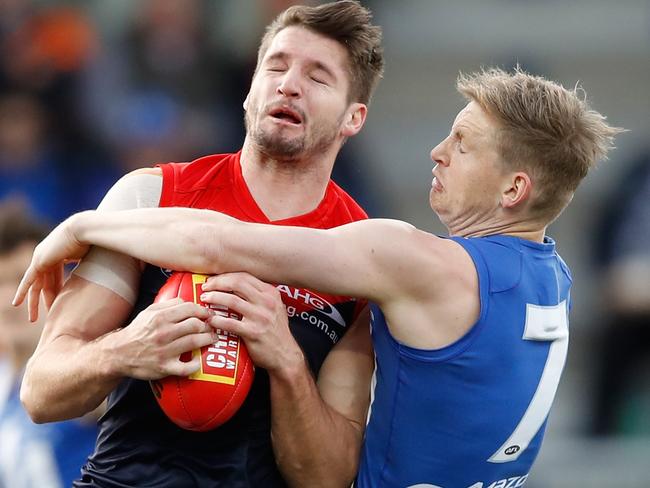 HOBART, AUSTRALIA - JULY 29: Jesse Hogan of the Demons is tackled by Jack Ziebell of the Kangaroos during the 2017 AFL round 19 match between the North Melbourne Kangaroos and the Melbourne Demons at Blundstone Arena on July 29, 2017 in Hobart, Australia. (Photo by Adam Trafford/AFL Media/Getty Images)