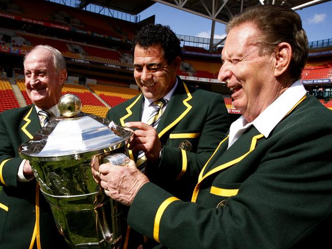 Rugby League greats l-r John Raper,Mal Meninga & Graeme Langlands with the Rugby League World Cup during a promotional launch at Suncorp Stadium .