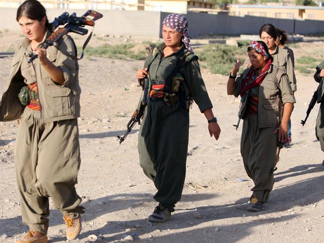 Some 50 women are among the fighters from the PKK on mount Makhmur who say they are fighting IS not only because the group has posed such a direct threat to the Kurds, but also because the group “is against women’s liberation”. AFP PHOTO/AHMAD AL-RUBAYE