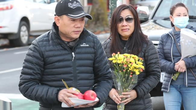 Thomas Tran’s mother and father in Oakleigh. Picture: David Crosling