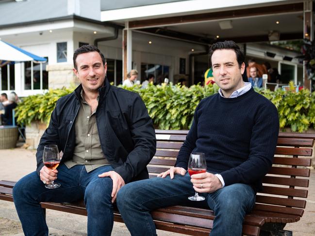 Portraits of property developers Jono (left) and Ben Isaac, outside The Boathouse Shelly Beach cafe in Manly. They have been expanding and refurbishing the dining empire. Picture: AAP Image / Julian Andrews