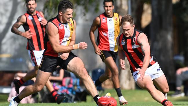 Anthony Skara (left) played his 200th game on Saturday, recording a major win with Goodwood over PNU. Picture: Keryn Stevens