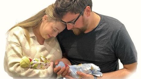 Lucy and Adam with their stillborn twins, Penny Christine and James Robert. Picture: Facebook