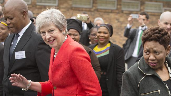 No one quite knows where to look during British Prime Minister Theresa May’s dancing. Picture: AP