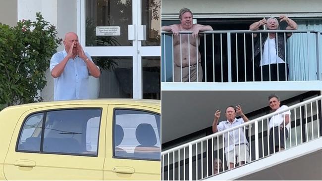 A number of people gathered on their balconies and outside apartments and hotels to boo at Palestine solidarity protesters marching along Surfers Paradise Esplanade. Picture: Amaani Siddeek