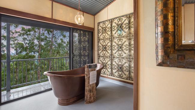 Plan a soak session in a copper bath with canopy views Gold Coast Tree Houses.