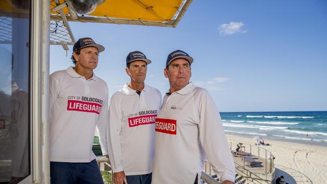 Veteran Gold Coast lifeguards (from left) Peter Ball, Scott Franzmann and Anthony Lunney have almost a century of experience between them. Picture: Jerad Williams