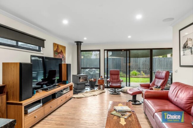 The home behind the cafe has a spacious lounge. Picture: 1st Choice Estate Agency San Remo