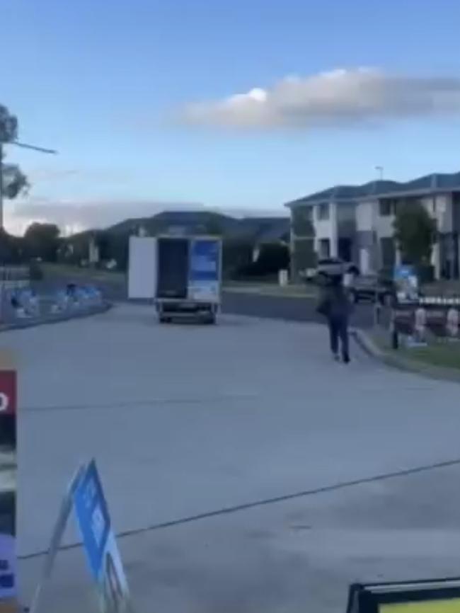 A Liberal Party campaign truck appears to have driven off with the back doors swinging wide open. Picture: Facebook.