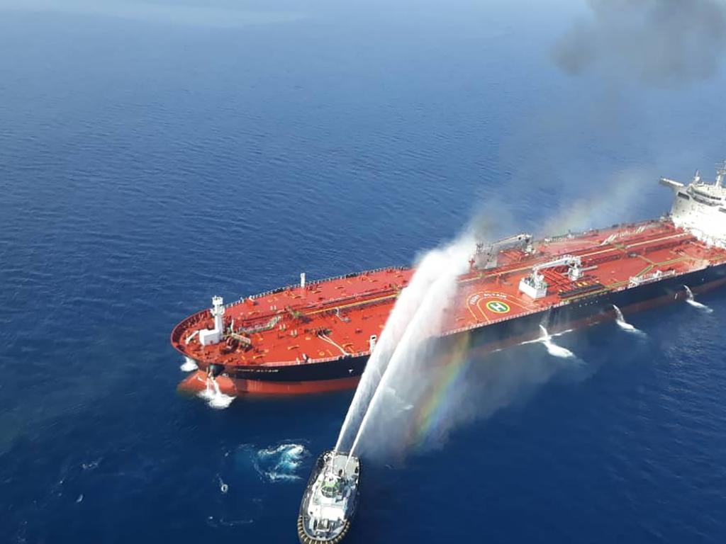 In this file picture obtained from the Iranian news agency, an Iranian navy boat reportedly tries to control fire from a Norwegian owned oil tanker. Picture: Tasnim News/AFPF