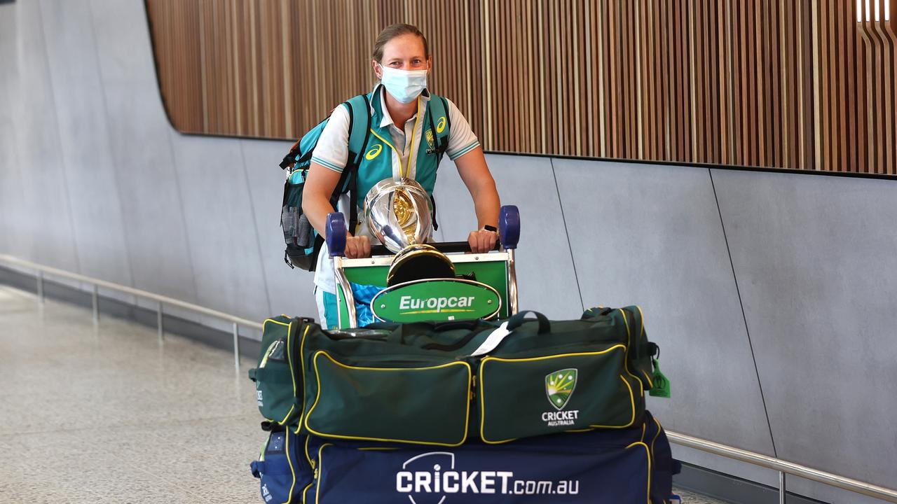 Australian captain Meg Lanning arrives home with the World Cup trophy. Picture: Graham Denholm/Getty Images