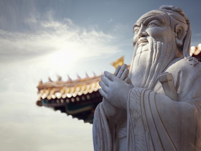 A stone statue of Confucius.