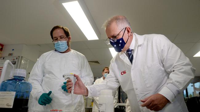 Prime Minister Scott Morrison poses for photographs in a CSL vaccine lab in Melbourne. Picture: NCA NewsWire