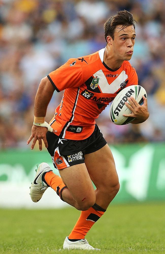 Tigers half Luke Brooks in action.