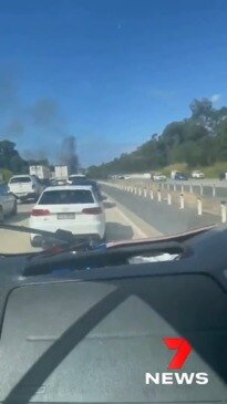 A fire on the M1 at Pimpama has brought the M1 to a standstill