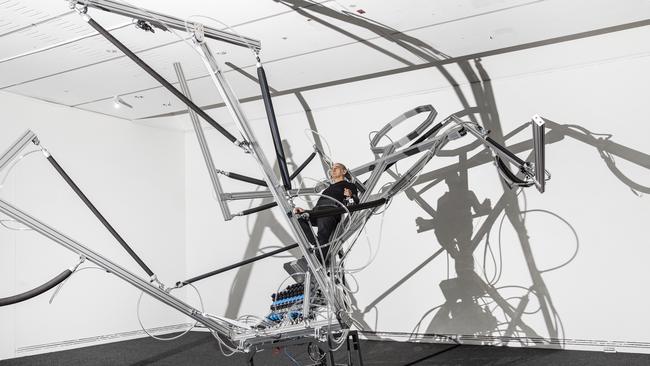 Stelarc with his work Reclining Stickman, 2020, at the Adelaide Biennial of Australian Art: Monster Theatres. Picture: Saul Steed.