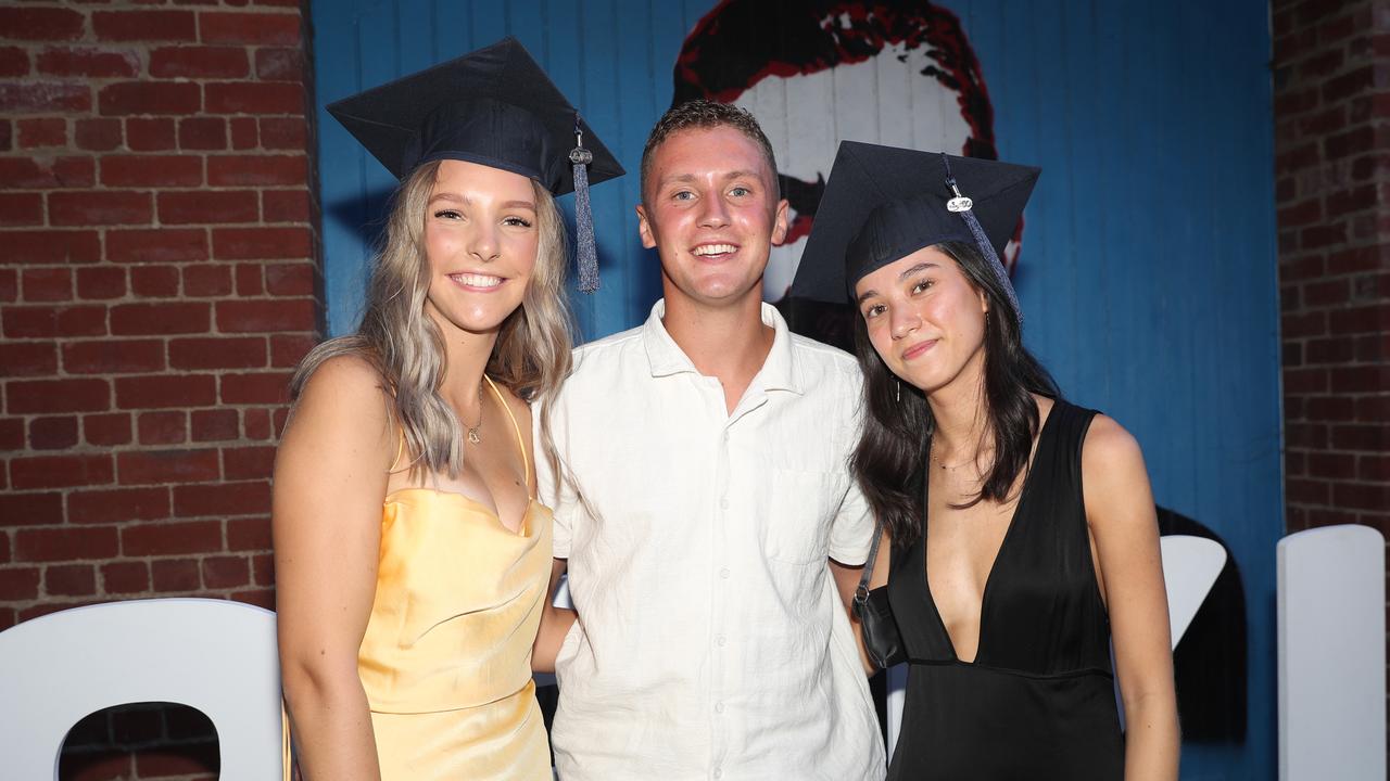 Graduate Sophia White, Jaylan Lessio, and graduate Emma Toffoli. Picture: Alan Barber