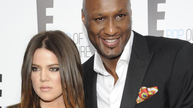 FILE - In this April 30, 2012, file photo, Khloe Kardashian Odom and Lamar Odom from the show "Keeping Up With The Kardashians" attend an E! Network upfront event at Gotham Hall in New York. A family representative says Lamar Odom has left a Las Vegas hospital and is now in the Los Angeles area to continue his recovery a week after being found unconscious at a Nevada brothel. Alvina Alston, publicist for Odom's aunt JaNean Mercer, said Tuesday, oct. 20, 2015, that the former NBA star was transported by helicopter from Sunrise Hospital and Medical Center in Las Vegas around 5 p.m. Monday. (AP Photo/Evan Agostini, File)