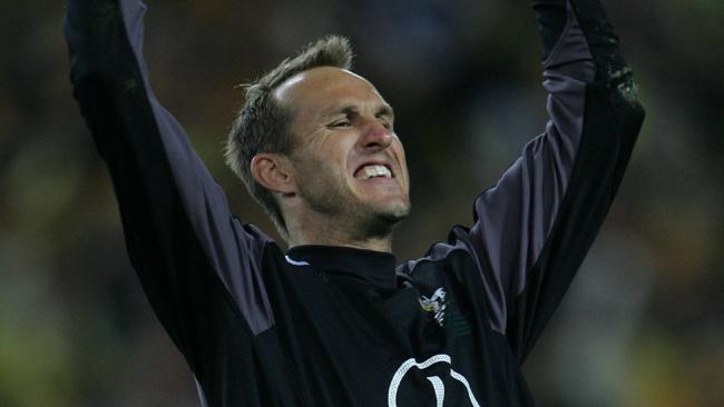 Socceroos goalkeeper Mark Schwarzer celebrates after making his first of two saves during penalty shoot-out during 2nd leg of Australia v Uruguay 2006 World Cup qualifying match at Telstra Stadium, Olympic Park, Homebush in Sydney.