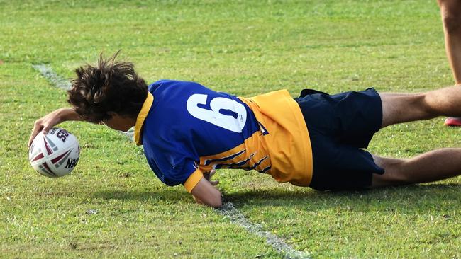 Matthew Spina, Gilroy, dots down. Photographs from the Will Murdoch Perpetual Shield. The annual U14 rugby league competition, in its second year, involved Gilroy Santa Maria College, Ingham State High School and St Teresa's Catholic College Abergowrie. Picture: Cameron Bates