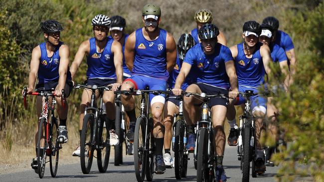 Bulldogs players get on the bikes. Picture: Getty