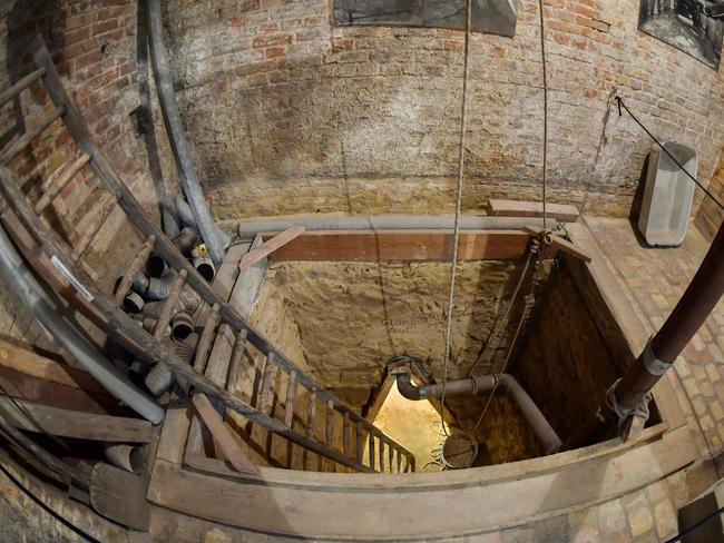 The shaft leading down into a tunnel at Bernauer Strasse has been reconstructed to show visitors what it would have been like. Picture: Tobias Schwarz / AFP