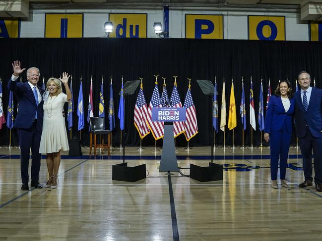 Joe Biden, with his wife Dr Jill Biden, socially distance from Kamala Harris and her husband Douglas Emhoff. Picture: AFP